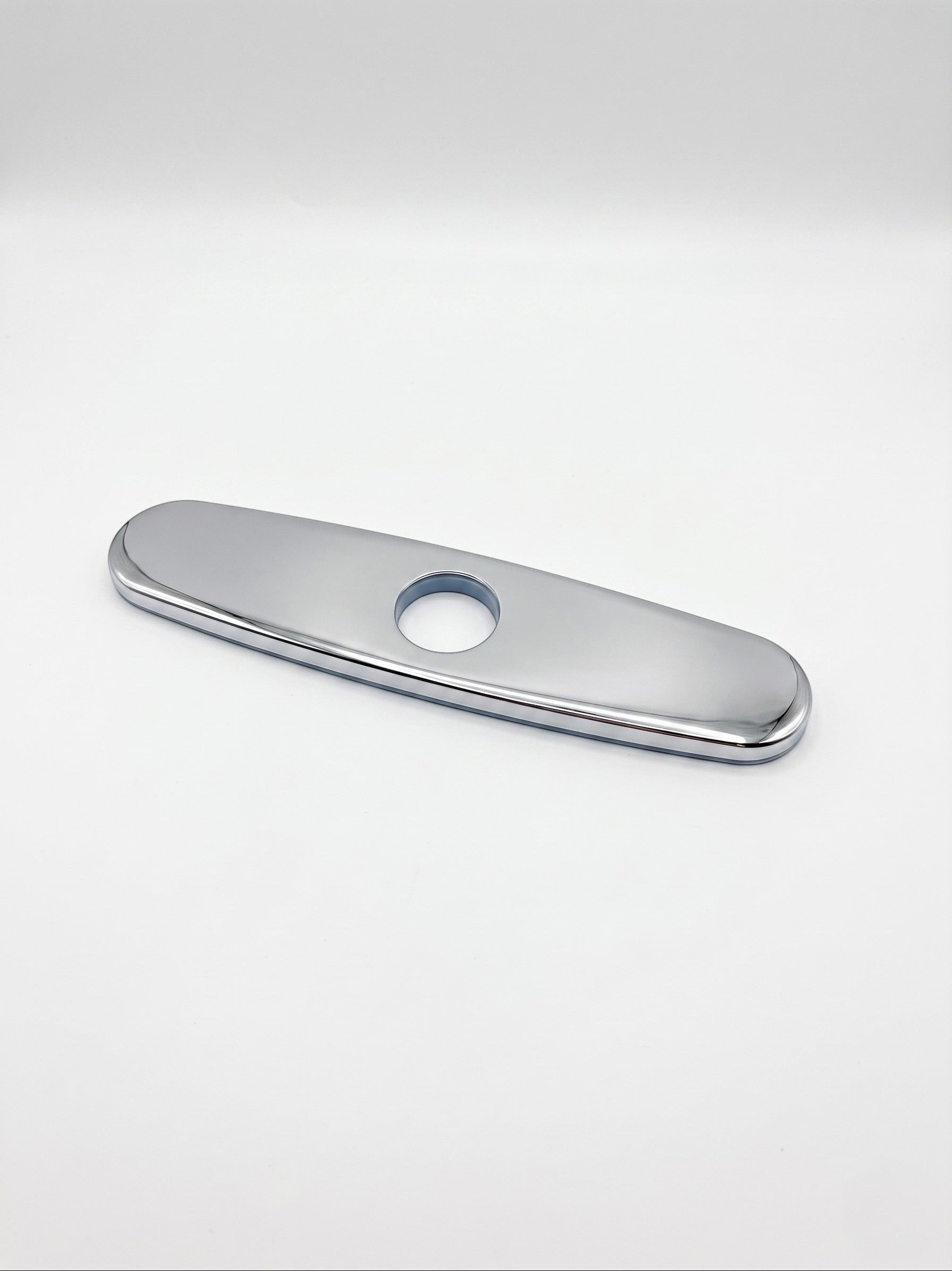 Onyx Elements chrome kitchen sink faucet deck plate escutcheon cover for single-hole faucet installations.