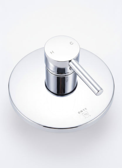 Onyx Elements chrome single-handle shower control valve with a sleek, modern circular wall plate.