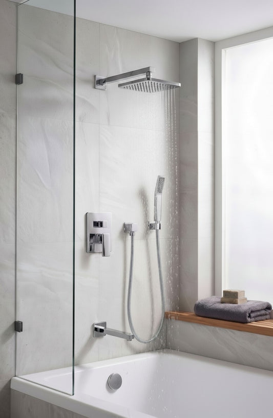 Onyx Elements chrome square rainfall shower system with handheld wand and tub spout in a modern tiled bathroom