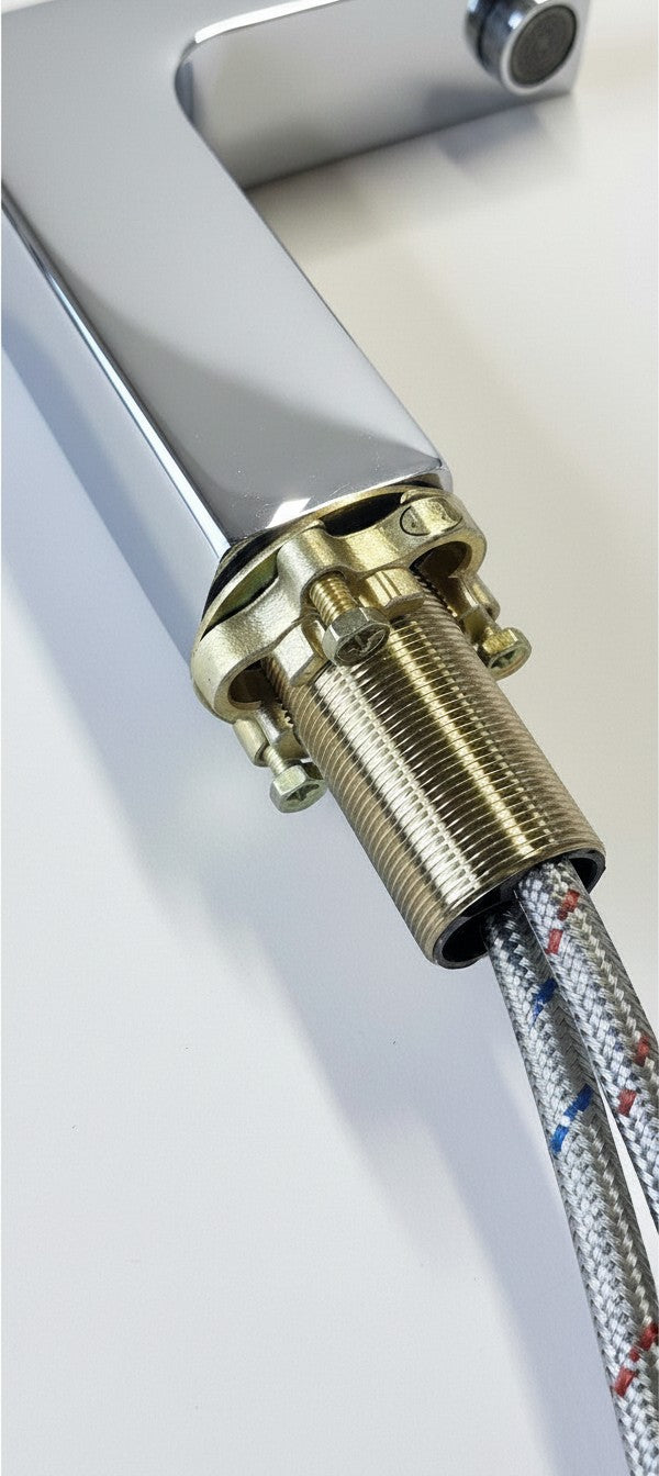 Onyx Elements chrome bathroom faucet with a modern squared edge design, brass locking nut, and braided supply lines.