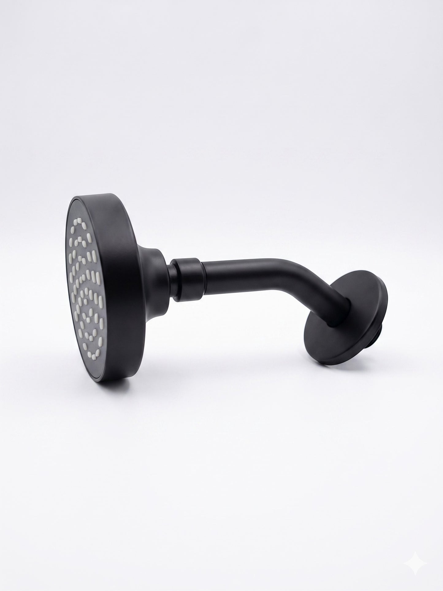 Onyx Elements matte black wall-mounted shower head with a modern minimalist design and circular spray face.