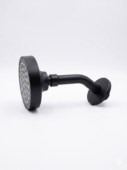 Onyx Elements matte black wall-mounted shower head with a modern minimalist design and circular spray face.
