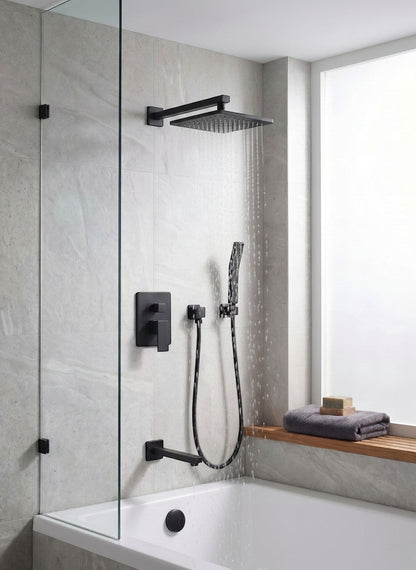 Onyx Elements matte black square rainfall shower system with handheld wand and tub spout in a modern tiled bathroom.