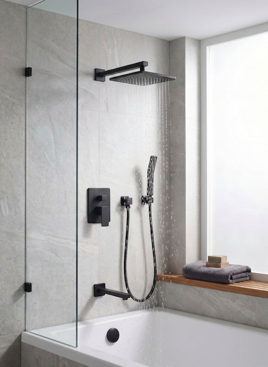 Onyx Elements matte black square rainfall shower system with handheld wand and tub spout in a modern tiled bathroom.