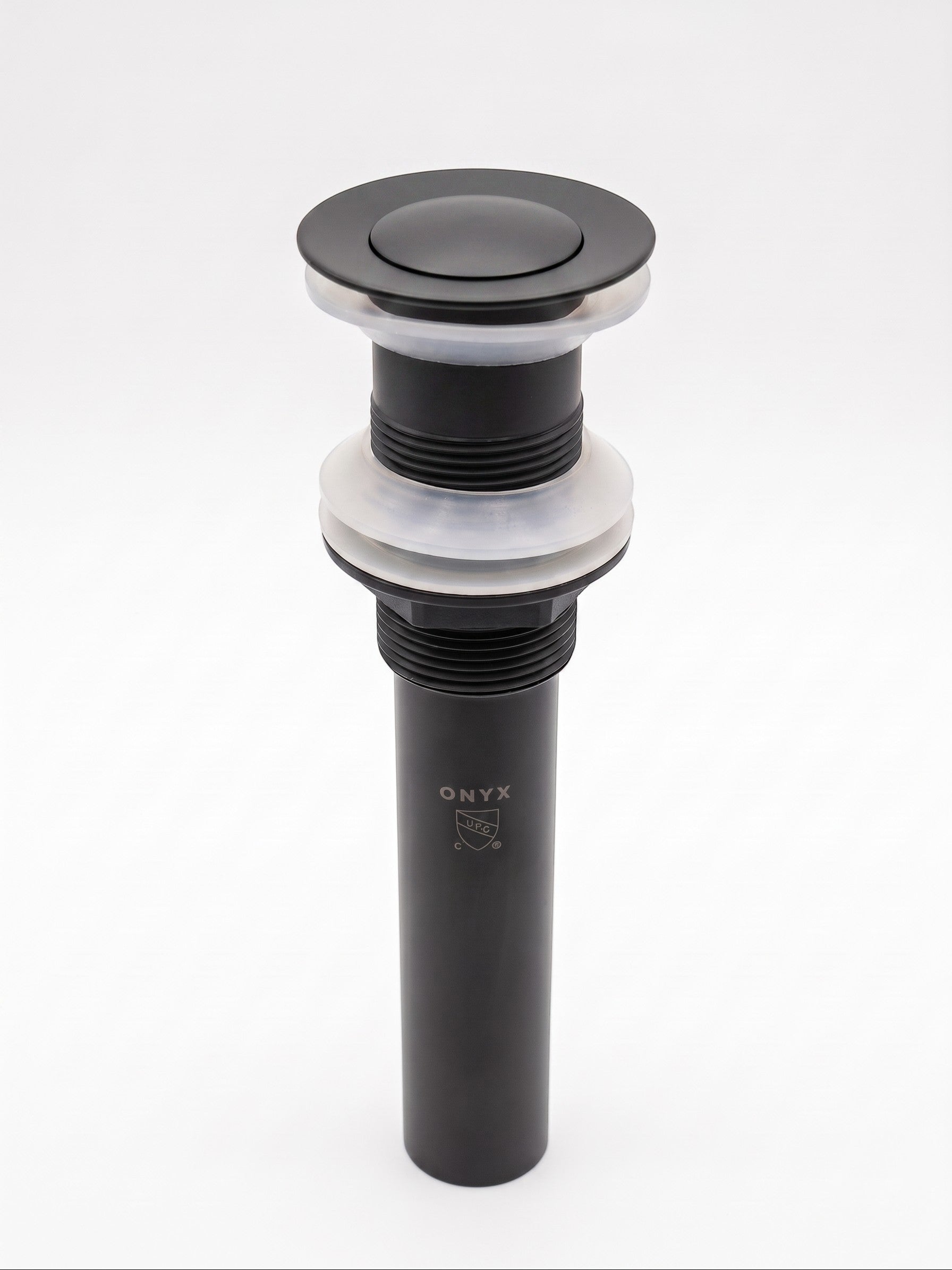 Onyx Elements matte black bathroom sink drain assembly with a push-button pop-up stopper and clear silicone gaskets.